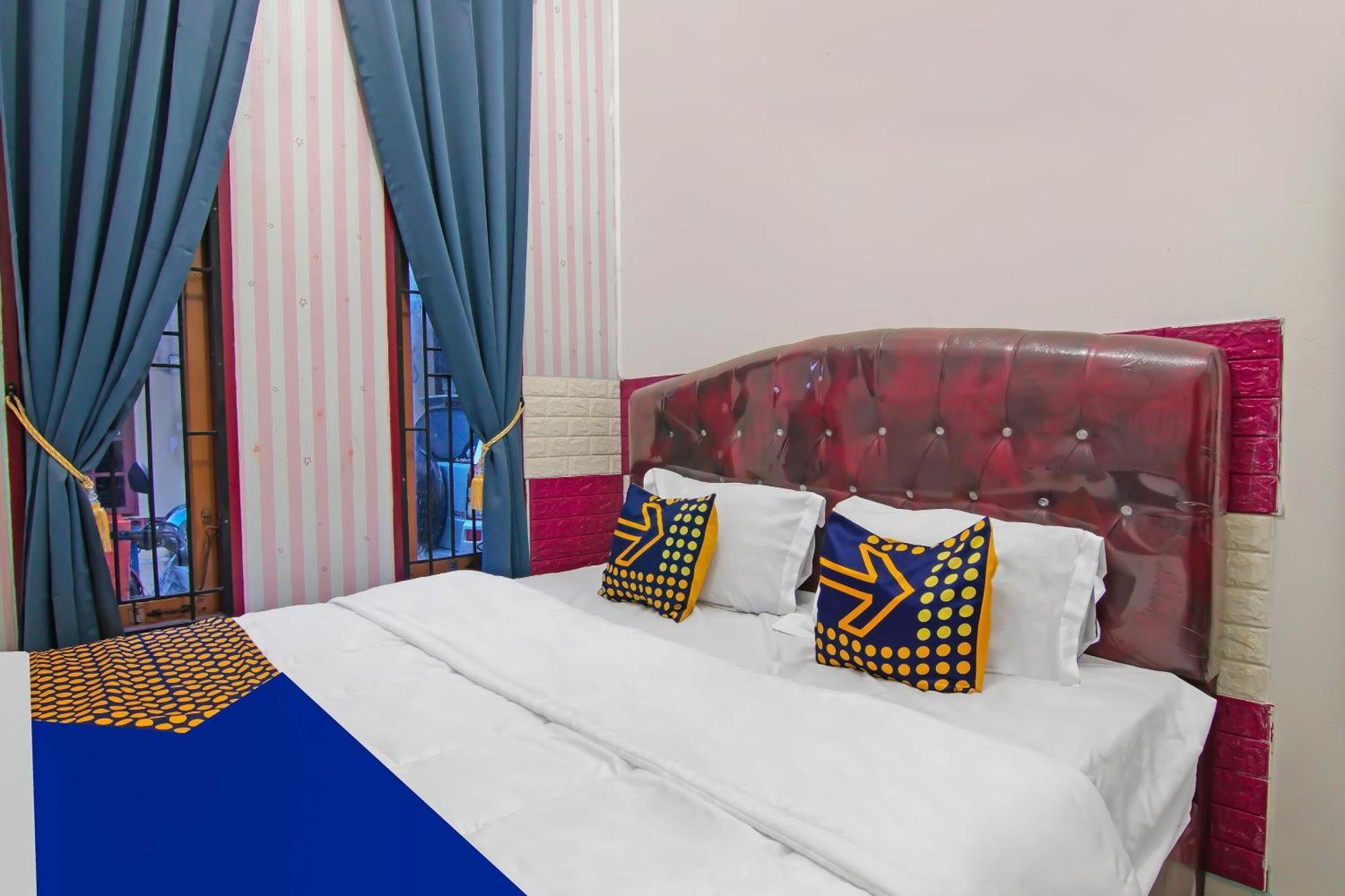 Hotel Spot On 92570 Putri Syariah Near Spbu Rimbo Panjang 2*
