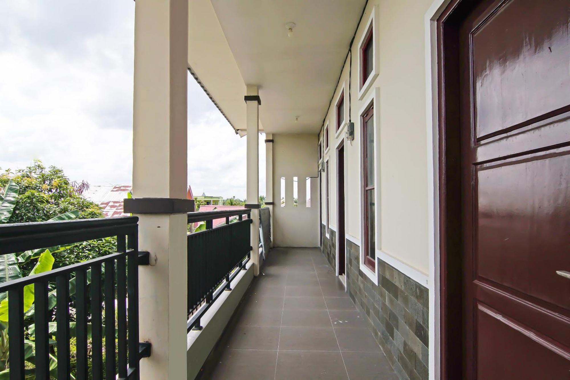 Hotel Spot On 92570 Putri Syariah Near Spbu Rimbo Panjang Pekanbaru